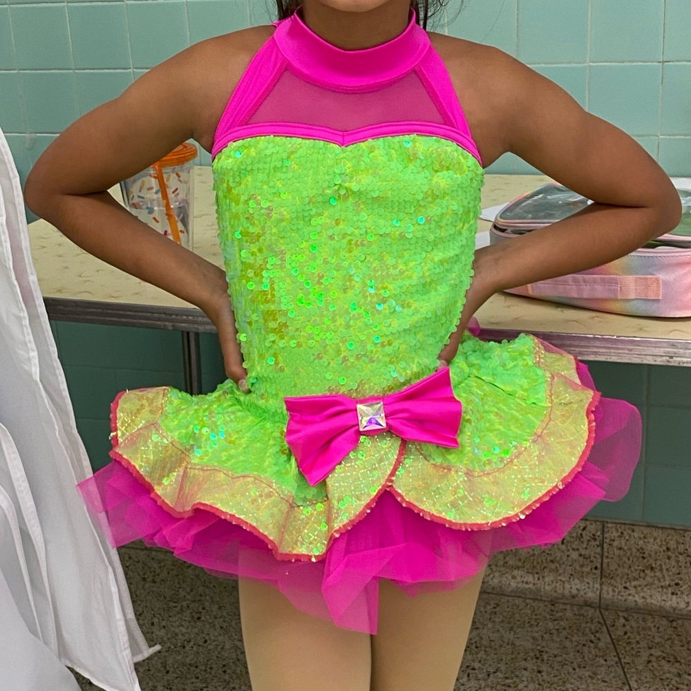 One piece Girls neon green and pink dance costume. Sequins & tutu, Shorts.